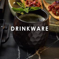 Commercial Drinkware collection displaying copper mugs stainless steel cocktail cups and novelty tiki mugs